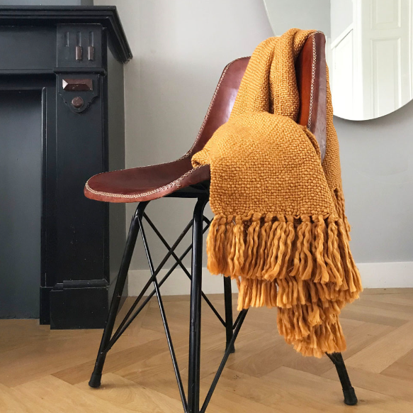 Plaid inca solid throw