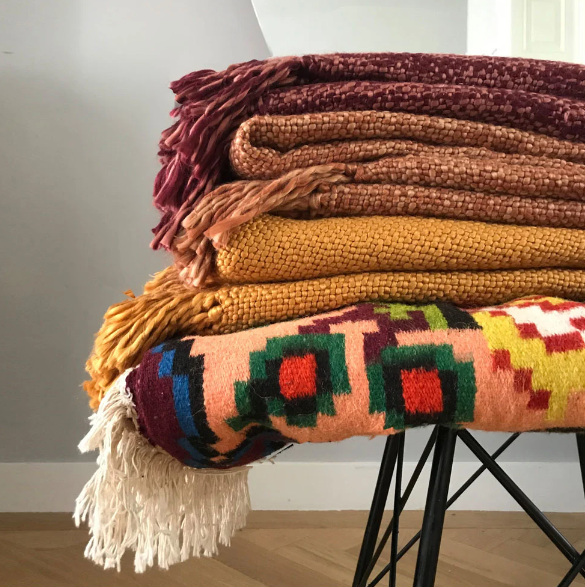 Plaid inca solid throw